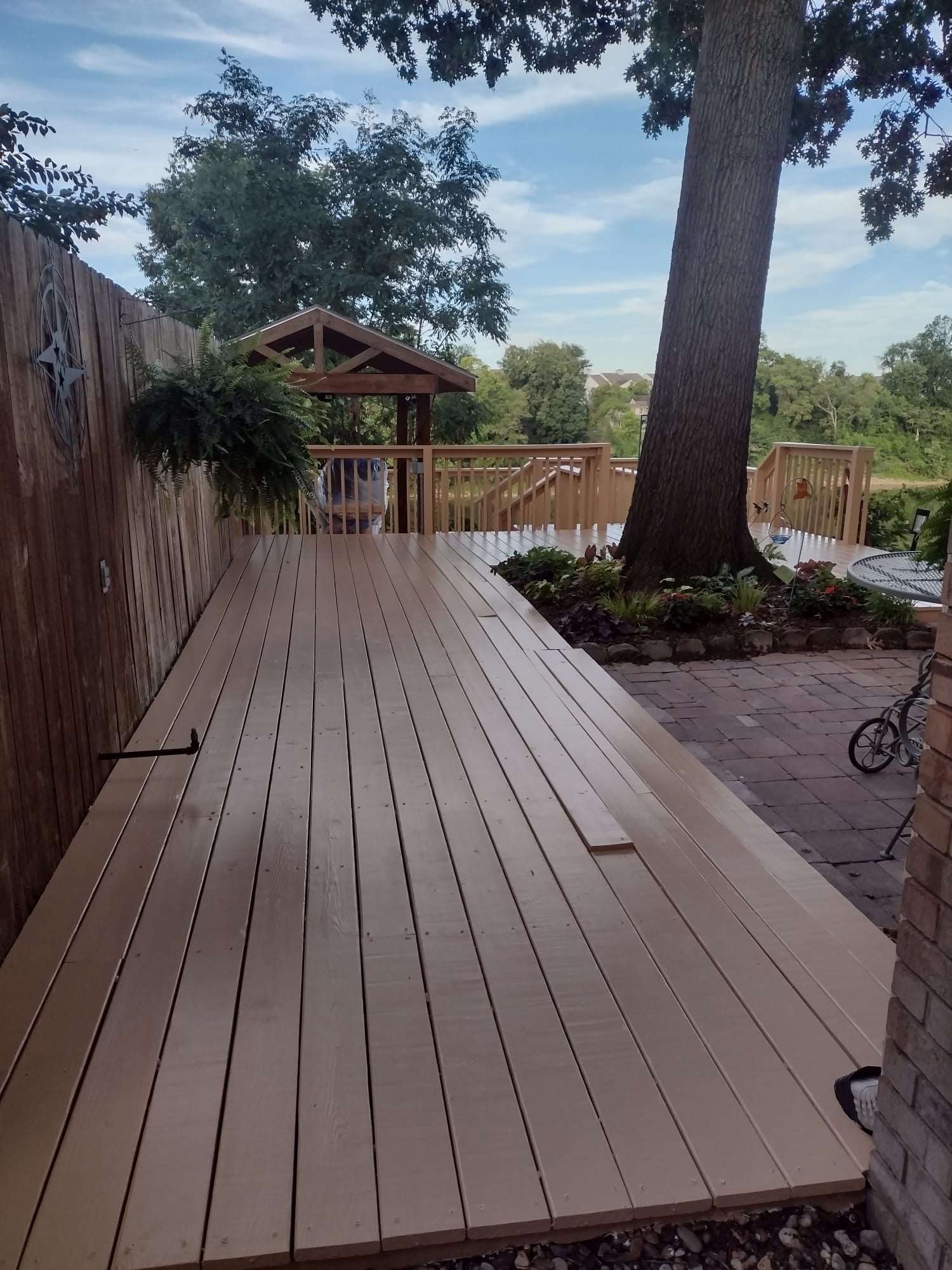 After — freshly stained natural deck