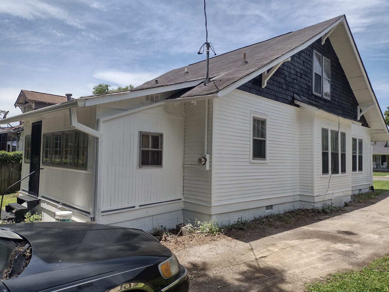 After — house side view freshly painted