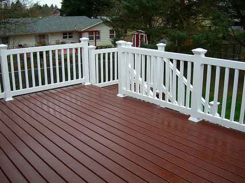 Painted brown deck with white railings